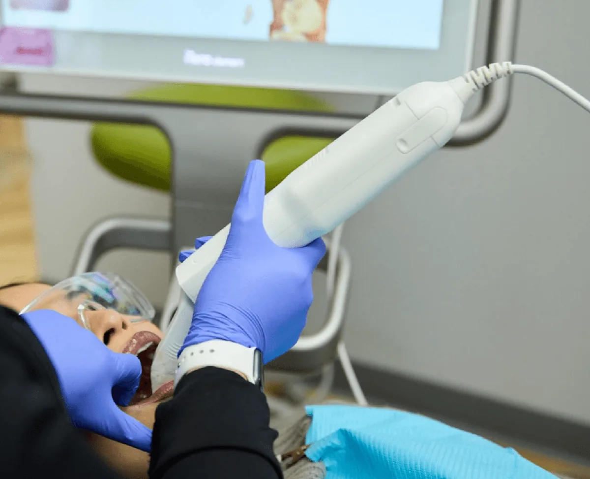 A patient lying on a dental chair